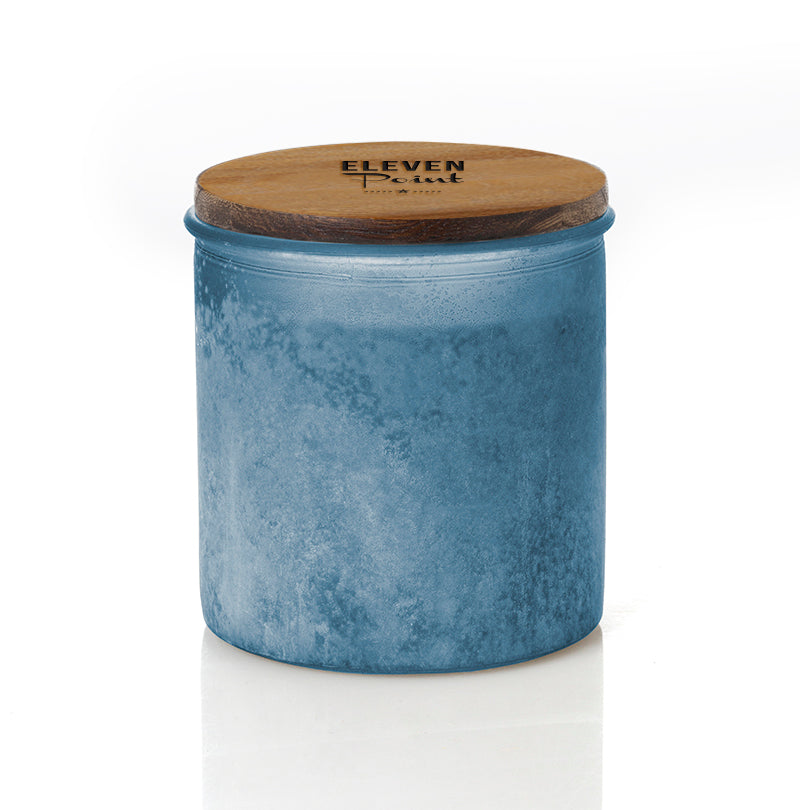 The River Rock Candle in Denim Candle Eleven Point